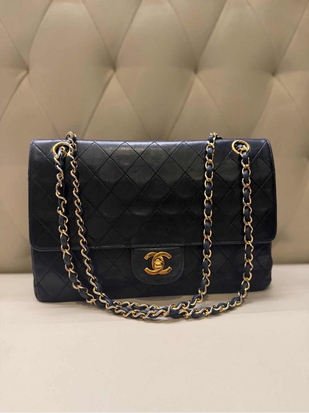 CHANEL Black Quilted Shoulder Bag with Gold Chain
